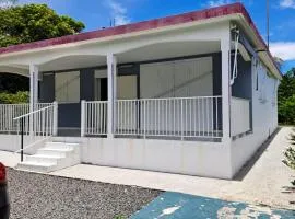 Maison de 2 chambres avec piscine partagee jardin clos et wifi a Le Moule a 3 km de la plage