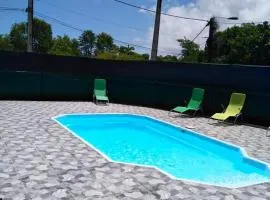 Maison de 2 chambres avec piscine partagee jardin clos et wifi a Le Moule a 3 km de la plage