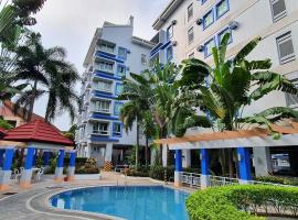 SCANDIA SUITES AT SOUTH FORBES Homey & Cozy 2-Bedroom Condo, hotel con parking en Silang