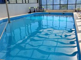 Casa c piscina água quente, hotel barato en Viana do Castelo