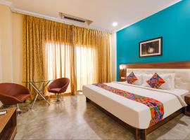 FabHotel Chris, hotel blizu znamenitosti Sri Sathya Sai Super Speciality Hospital, Bangalor