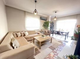 Şehrin kalbindeki deniz manzaralı 3+1 ev, hotel a Mersin