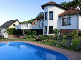 Spacious villa with private swimming pool, hotel with pools in Ballenstedt