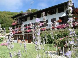 The Duck's Cottage, hotel con estacionamiento en Feltre