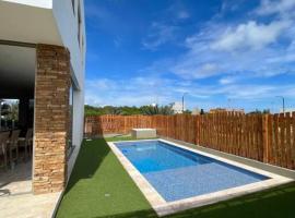 Amazing villa in club house with pool/beach, alquiler vacacional en Juan de Acosta