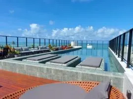 Lindo flat espaçoso e com vista mar - 50m da praia