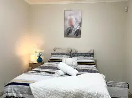 Ground floor Unit underneath a family Home