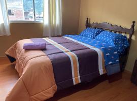 Departamento en el centro de la ciudad de Baños con netflix, wifi, garage gratuito y una excelente vista, hotel v destinaci Baños
