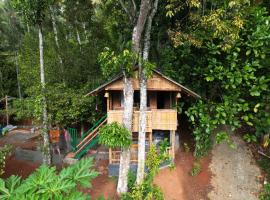 Fab - Bamboo Hut with Open Shower، مكان مبيت وإفطار في مونار