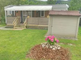 Grand Mobil Home 6 personnes climatisé avec 3 chambres et 2 salles de bains à Munster en Alsace