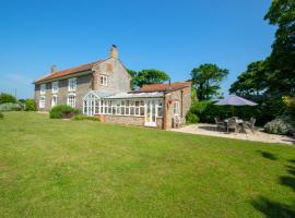 Bizewell Farmhouse, holiday home in Trimingham