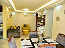 Stylish 3-bedroom condo with a Power-backup, Swimming pool and Gym, holiday rental in Kampala