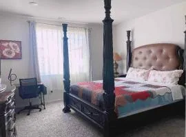 Large master bedroom with Separate bathroom and work desk on the first floor