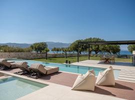 Pnoe Villas - Seafront Experience, hotel with parking in Tavronitis
