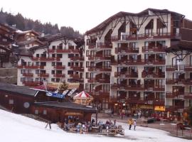 Ski-in ski-out 1 bed, La Tania, отель в Куршевеле