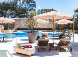 Ogygia Suites Gozo, hotel with pools in Għarb