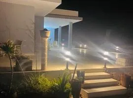 Beach house wing in kerkennah island. Fully equipped place for 4 guests and peaceful relaxing stay. Calm sea and beautiful sun rise that can be enjoyed straight on the beach or from the house terrace.