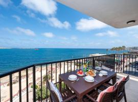 Islet Promenade Seafront Apartment with large Corner Terrace by Getawaysmalta, hotel a San Pawl il-Baħar