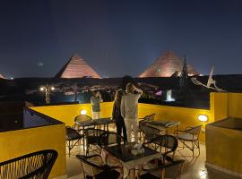 Pyramids Plateau View, proprietate de vacanță aproape de plajă din Cairo