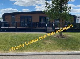 Trinity lodge hot tub escapes at Tattershall lakes, resort village in Tattershall