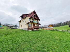 Cabana Poiana Dealul Frumos, chalet de montaña en Gârda de Sus