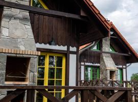 Osada Biały Wilk domek "Żółty", cabin in Przysłup