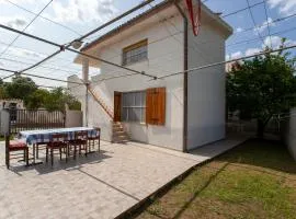 Casa con giardino