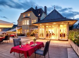 Gästehaus & Weingut Clüsserath-Weiler, hotel de 4 estrellas en Trittenheim