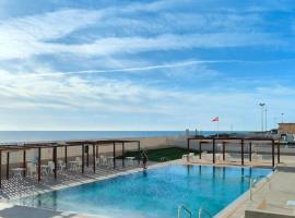 Apartamento prémium con 5 Piscinas Barbacoa Tenis Frontenis, hotel em Mareny Blau