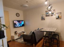 Davao Vacation Hub near Sasa ferry terminal with netflix,Wifi, pool access, hotel v destinaci Davao