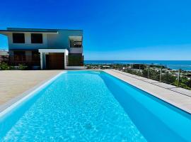 Heaniki'z apartment ocean view pool near Papeete - 2 bdr - AC - Wifi, hotel met zwembaden in Arue