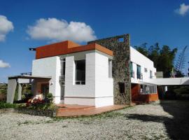 Hotel Familiar El Remanso Del Agua, alberg a Guatapé