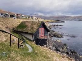Unique boathouse by the foreshore / Sea view