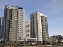 Апартаменты в жилом комплексе БИИК、シムケントのホテル