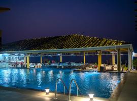 The Gold Beach Resort, hotel dekat Daman Airport - NMB, 