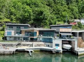Panoramaresort in Hardangerfjorden leilighet i sjøkanten ved Hardangerfjorden for 7 personer boat , sauna,kajak, SUP for rent