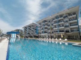 Calypso Residence Luxurious Beachside Apartment in Alanya D6, hotelli kohteessa Alanya lähellä maamerkkiä Kestelin kunta