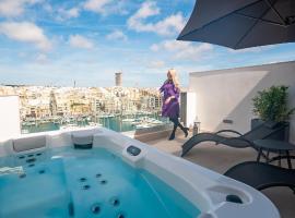 The Address Seafront Suites with Hot Tub, alquiler vacacional en Pieta