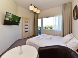 Cozy stay by Kaunas vila 9Vėjai، فندق في Girininkai