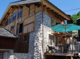 Appartement Dans Chalet de Montagne, allotjament d'esquí a Bozel