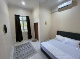 King's Cottage Homestay Kubang Kerian, קוטג' בקוטה בארו