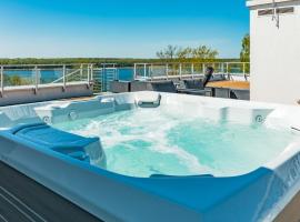 Apartamenty Stranda Residence nad jeziorem Mazury Holiday, lavprishotell i Giżycko