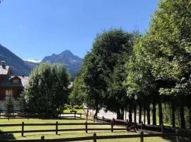Appartamento ampio giardino adiacente piste sci 4/6 posti letto