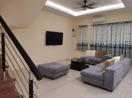 Cozzy26 Homestay, hotell i Bintulu