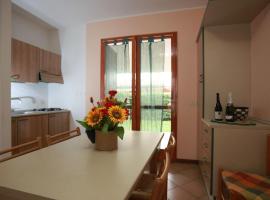 Villetta a schiera Salina con giardino privato e portico, hotel a Rosolina Mare
