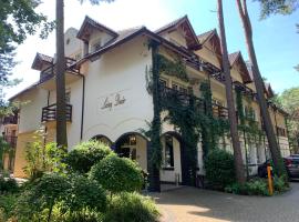 OW LeśnyDwór, Hotel in Pogorzelica