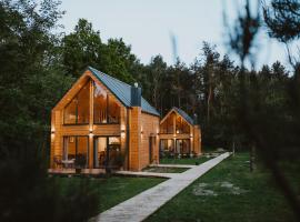 Domki Przystań Spławy, hotel cerca de Lago Piaseczno, Załucze