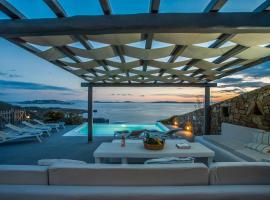 Villa Alitis by Mykonos Rocks, ваканционно жилище на плажа в Миконос