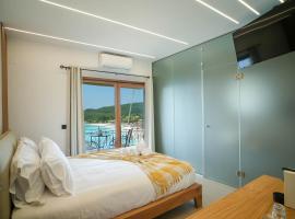 Omnia Deluxe Rooms, hotel near Sarakiniko beach, Parga