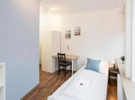 Zentral gelegene Zimmer mit Gemeinschaftsbad und Küche